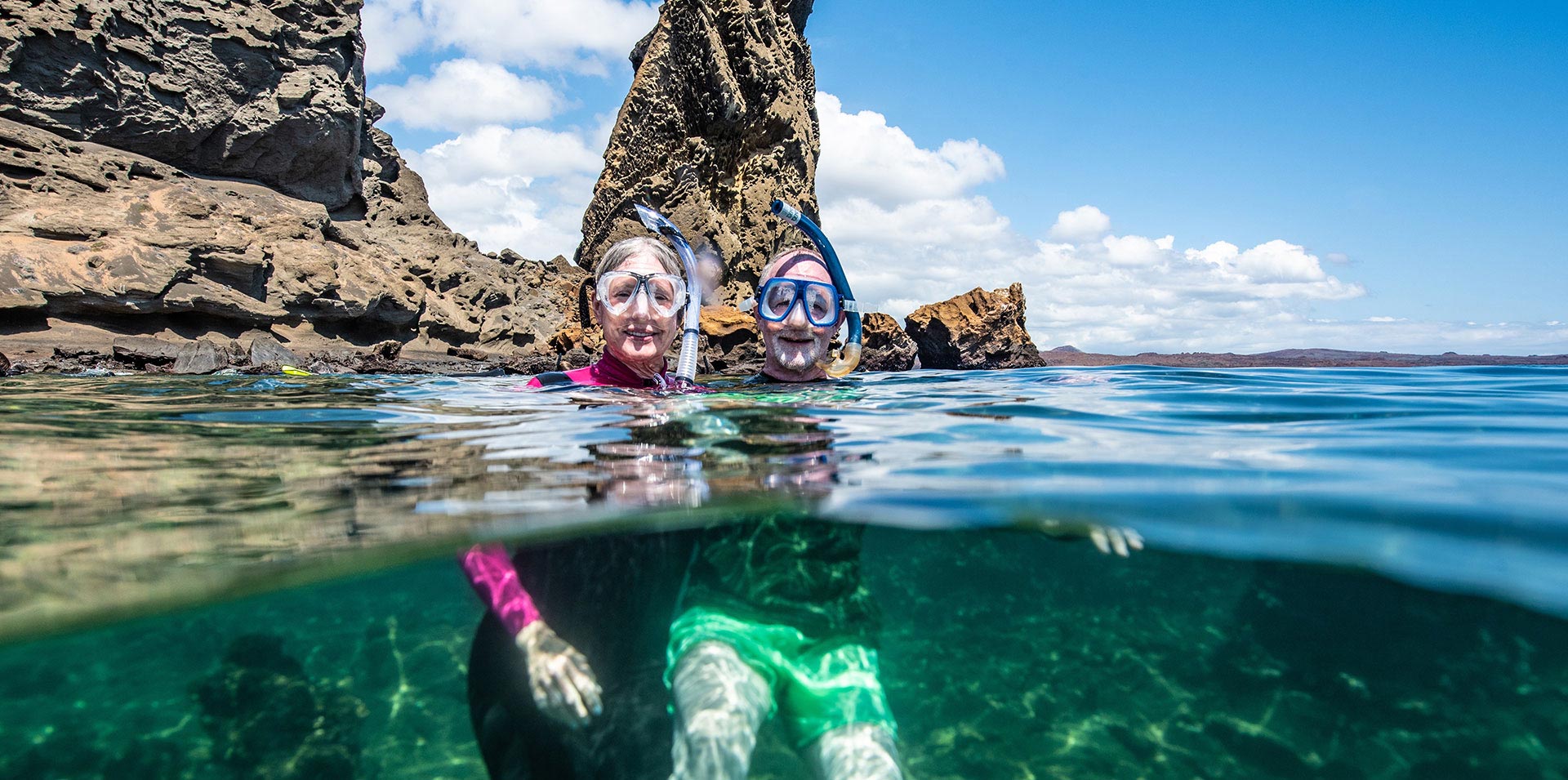 //www.som2travel.es/cdn/images/content/Islas Galapagos/galapagos-snorkeling-senior-traveler.jpg